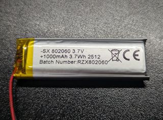 Flat lithium polymer pouch cell labelled 802060, 3.7 V, 1000 mAh, with red and black leads
