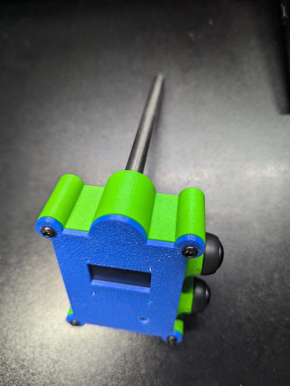 Top view showing the stainless steel temperature probe leaving the body